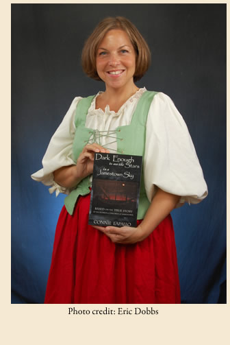 Connie in costume with book